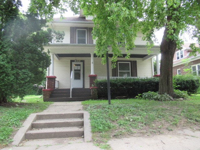 view of front of home featuring covered porch