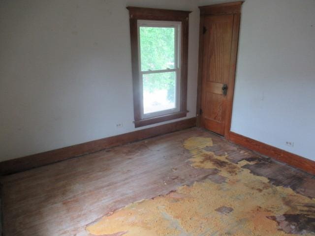 empty room featuring hardwood / wood-style floors