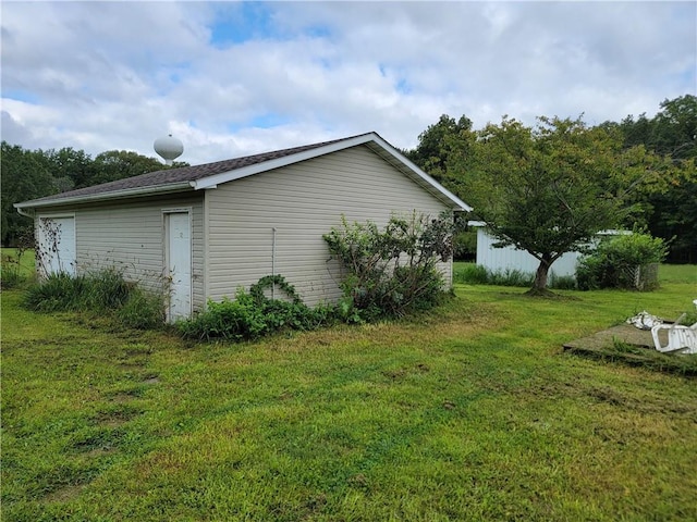 view of property exterior featuring a lawn