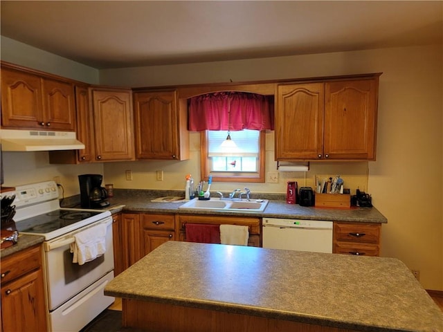 kitchen featuring white appliances and sink