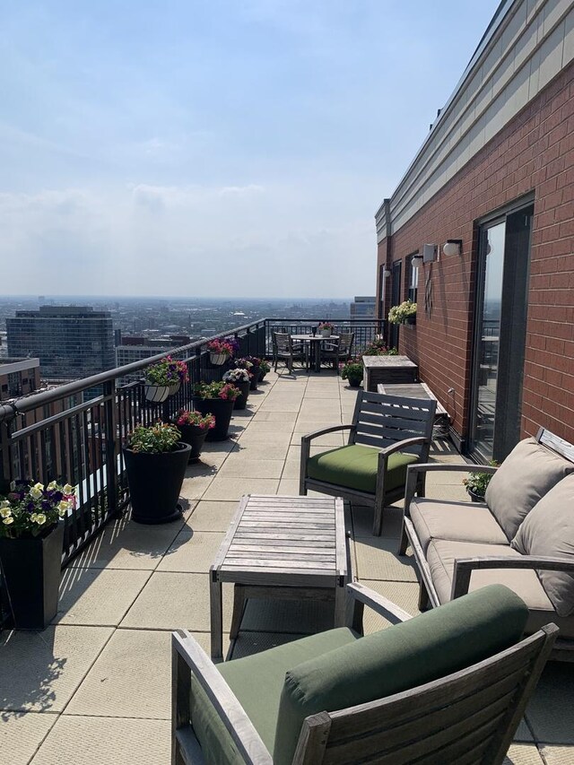 view of patio / terrace with a balcony