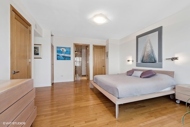 bedroom featuring light wood-type flooring