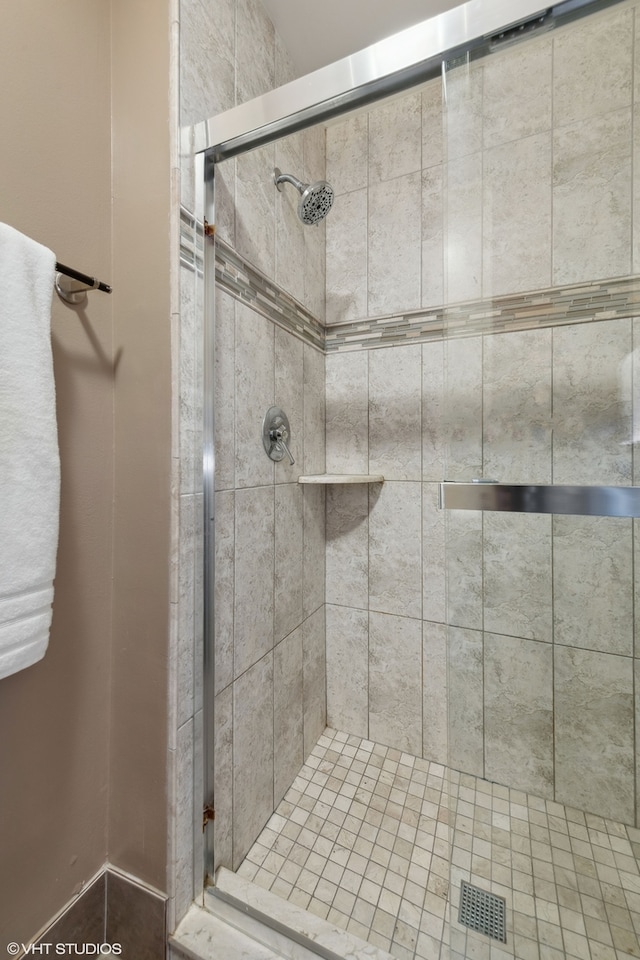 bathroom with an enclosed shower