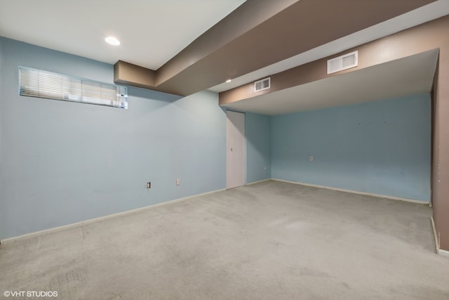 basement featuring carpet flooring