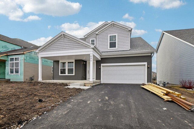 view of front of property with a garage