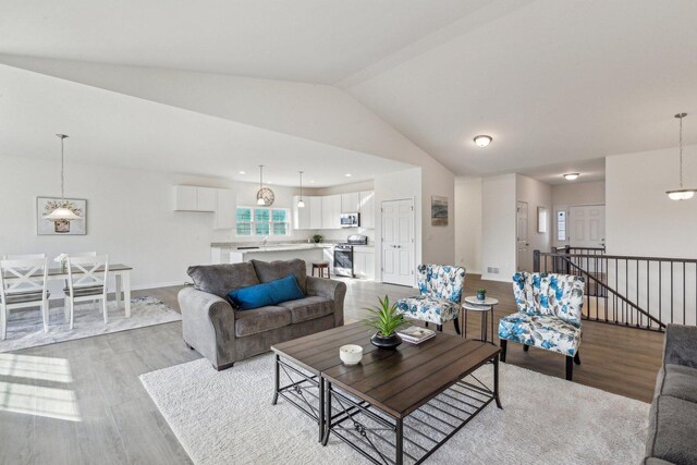 601 Virginia St, Elburn, IL 60119 - living room featuring baseboards, wood finished floors, and a premium fireplace