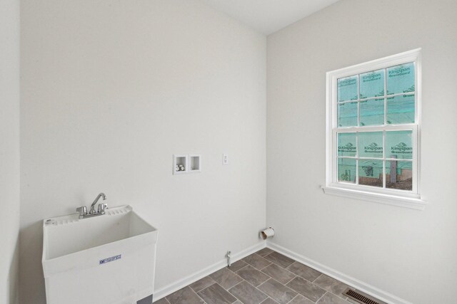 601 Virginia St, Elburn, IL 60119 - hallway with a sink, baseboards, an upstairs landing, wood finished floors, and vaulted ceiling