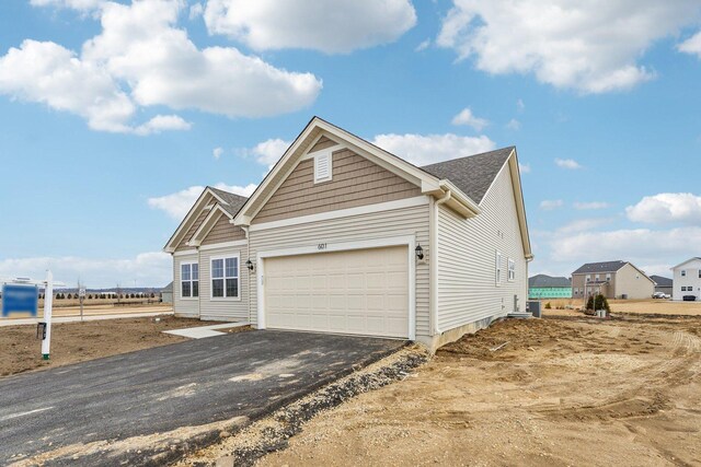 601 Virginia St, Elburn, IL 60119 - back of house with an attached garage