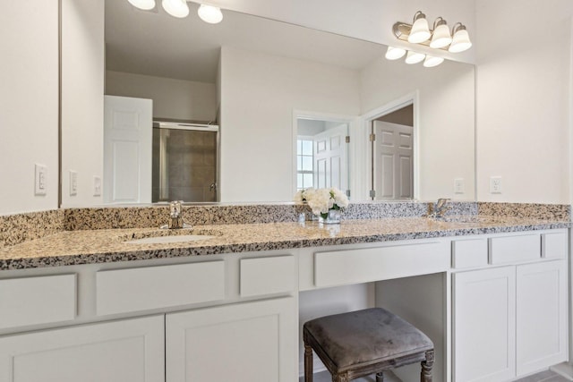601 Virginia St, Elburn, IL 60119 - full bath featuring a sink, tile patterned flooring, double vanity, and connected bathroom