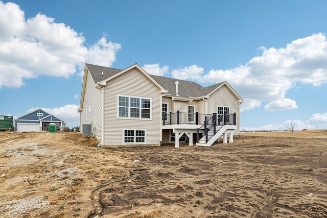601 Virginia St, Elburn, IL 60119 - rear view of house with a wooden deck, a shingled roof, cooling unit, and stairway