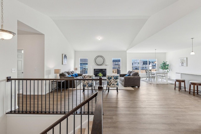 601 Virginia St, Elburn, IL 60119 - living area with wood finished floors, a glass covered fireplace, and lofted ceiling