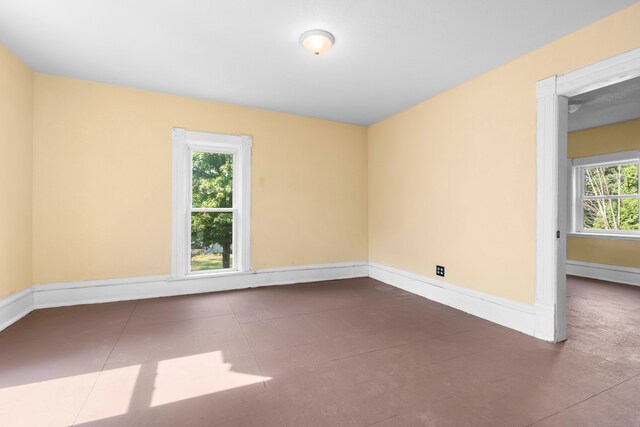 unfurnished room with a wealth of natural light