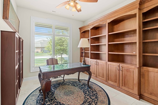 office area featuring light tile patterned floors and ceiling fan