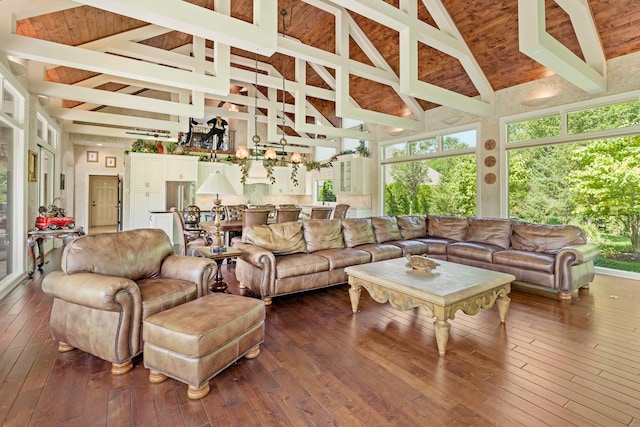 sunroom / solarium featuring wood ceiling and vaulted ceiling