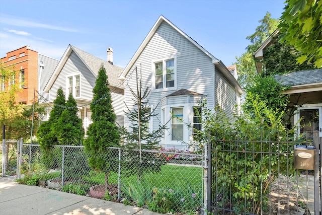 view of front of house with a front lawn