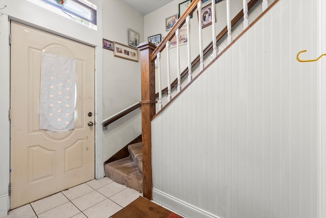 entrance foyer featuring light tile patterned floors