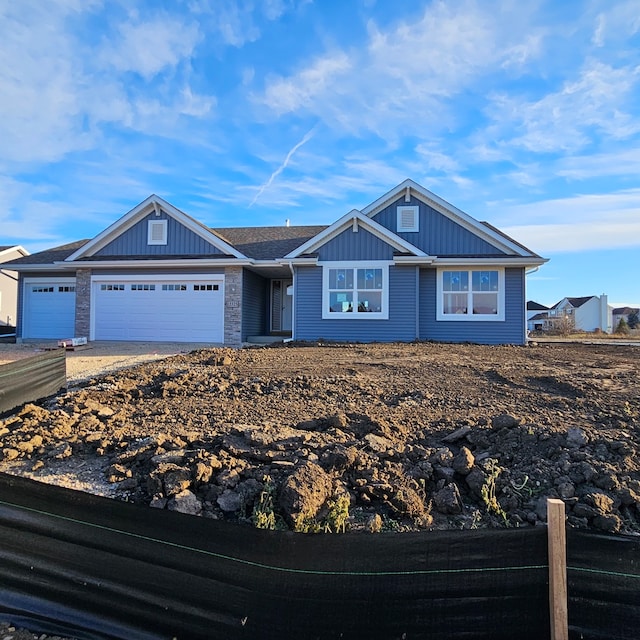 view of front of property with a garage