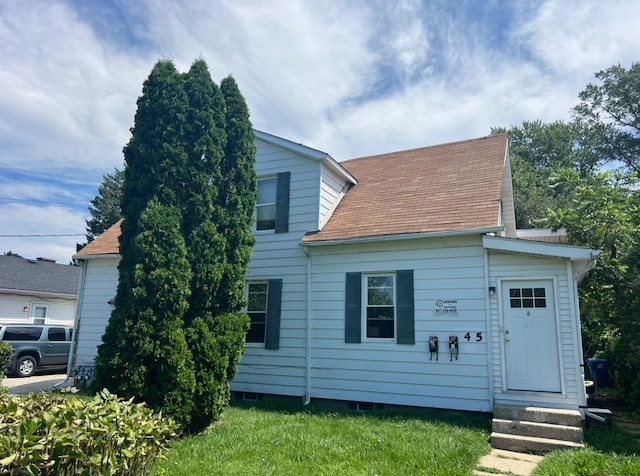 exterior space with a lawn