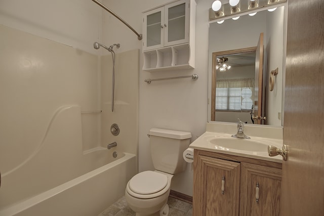 full bathroom featuring ceiling fan, toilet, tile patterned flooring, vanity, and bathtub / shower combination