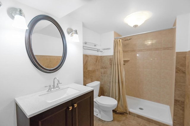 bathroom featuring decorative backsplash, vanity, and toilet