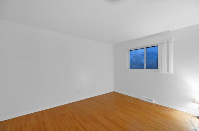 bedroom with hardwood / wood-style floors