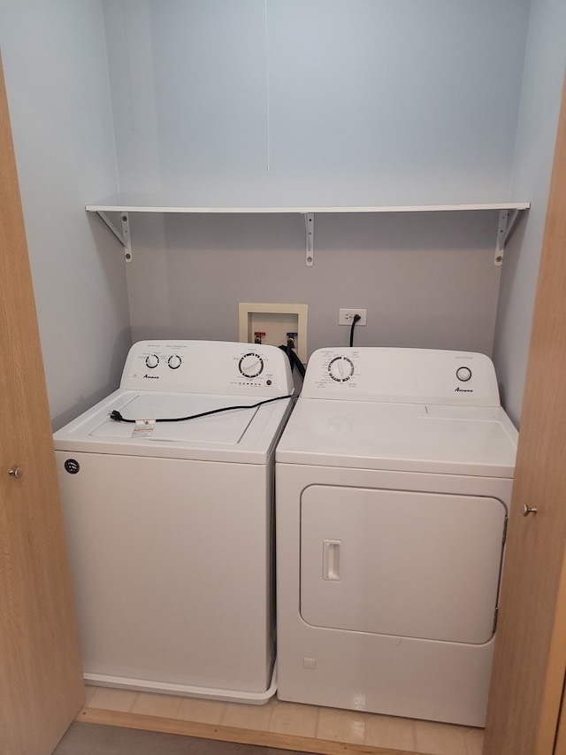 laundry area featuring independent washer and dryer