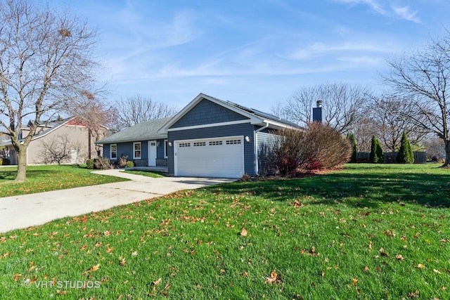 ranch-style home with a front yard and a garage