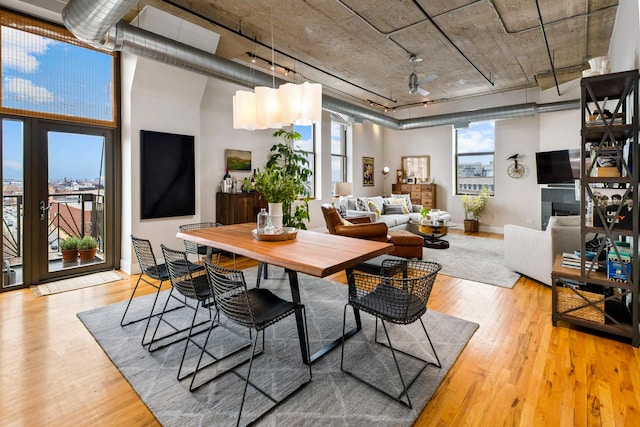 758 N Larrabee St Unit 811, Chicago, IL 60654 - dining space featuring baseboards and wood finished floors