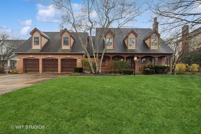 cape cod-style house with a garage and a front lawn