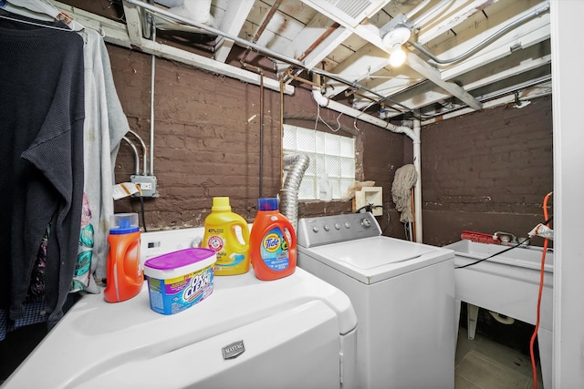 washroom with washer and clothes dryer