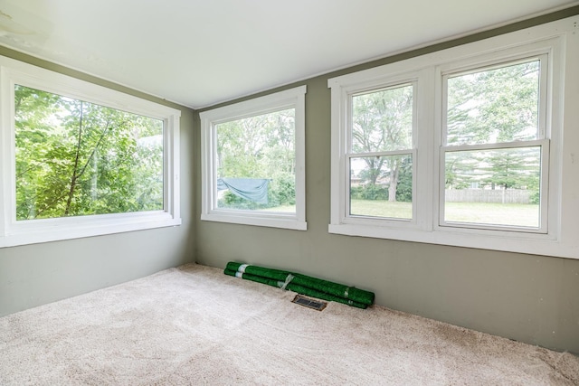 sunroom / solarium featuring visible vents