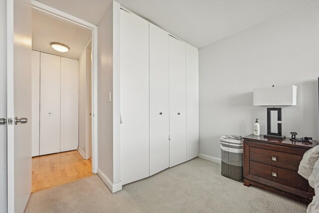 carpeted bedroom featuring a closet