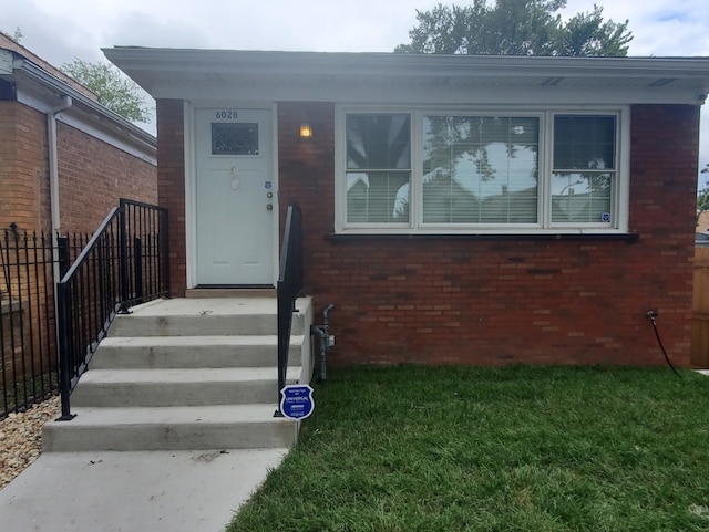 view of front of home with a front yard