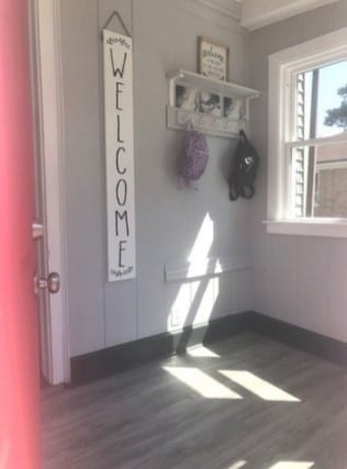 mudroom with dark hardwood / wood-style flooring