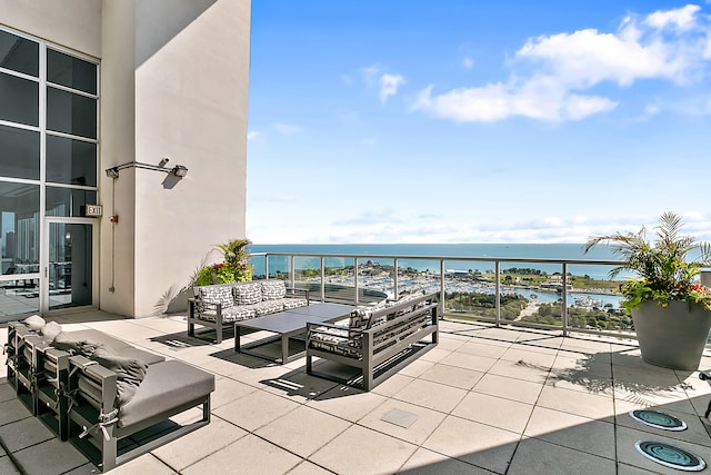 view of patio / terrace with a water view