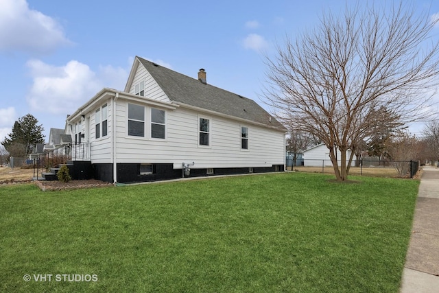 view of property exterior featuring a lawn