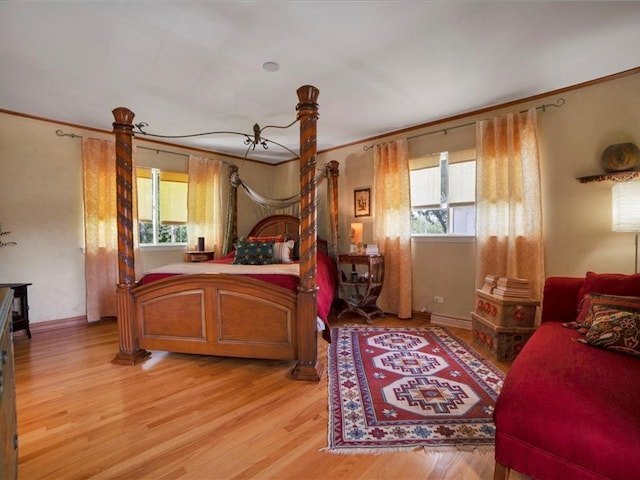 bedroom with light hardwood / wood-style flooring