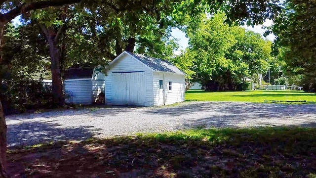 garage with a storage shed