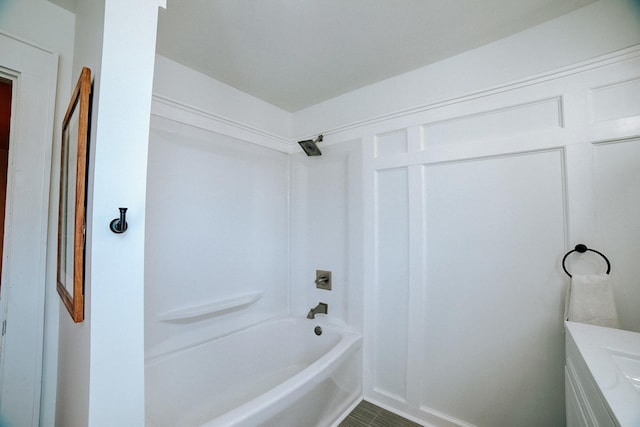 full bathroom featuring bathing tub / shower combination and vanity