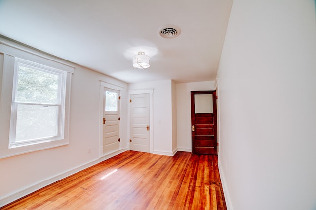 interior space with hardwood / wood-style flooring