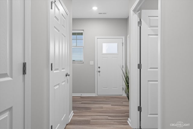 hall featuring light hardwood / wood-style floors