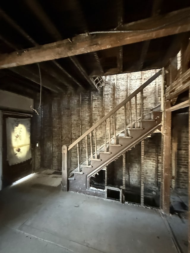 unfinished basement with stairway