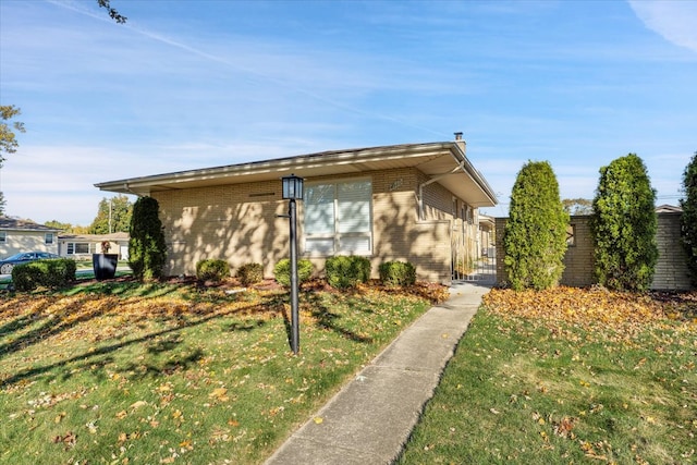 view of front of property with a front lawn