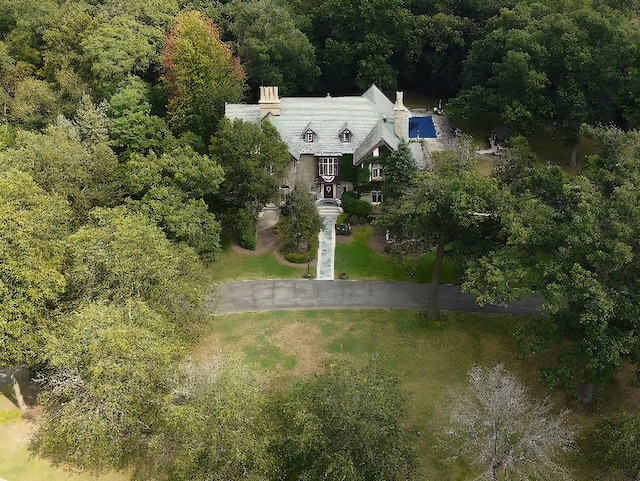 aerial view featuring a view of trees