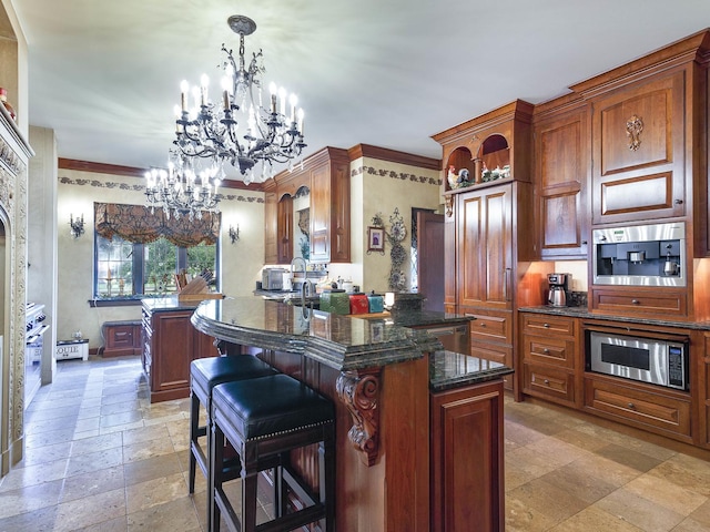 kitchen with stainless steel microwave, a breakfast bar, pendant lighting, stone tile flooring, and open shelves