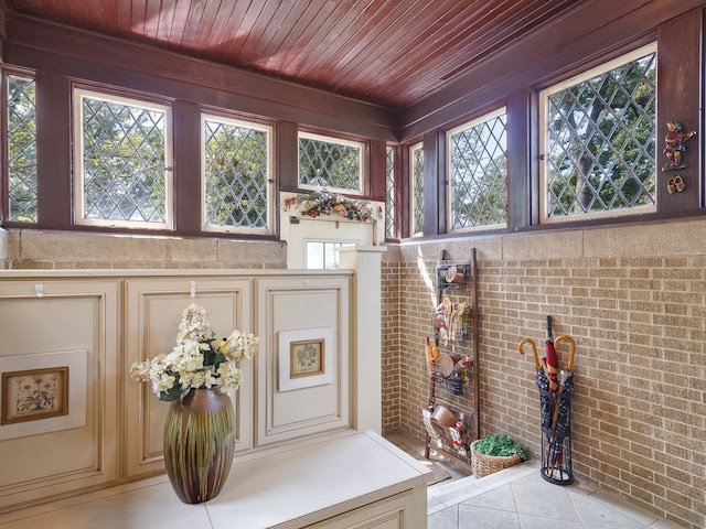 interior space featuring wood ceiling