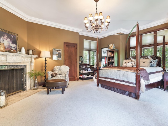 carpeted bedroom featuring ornamental molding, a premium fireplace, and an inviting chandelier