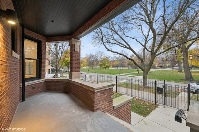 view of patio featuring a porch