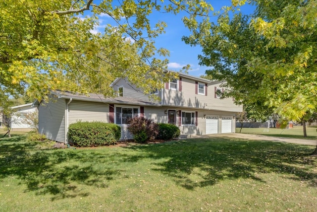 view of front of property with a garage and a front lawn