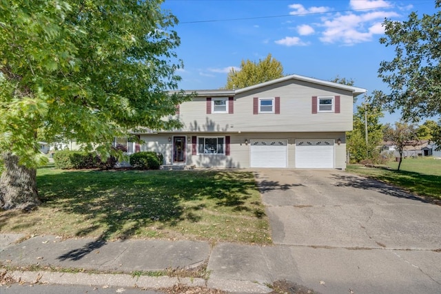 view of front facade featuring a front yard and a garage